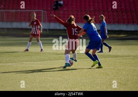 Women football, a tough duel between player Stock Photo