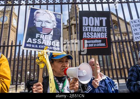LONDON, UK. 20 April, 2022 . Supporters of WikiLeaks Co-founder Julian Assange demonstrate outside the houses of parliament  after Westminster magistrates court has formally approved the extradition of Julian Assange to the US on espionage charges, a decision  for his extradition is to be made by the UK home secretary, Priti Patel. Julian Assange has been in remand at Belmarsh since September 2021 Credit: amer ghazzal/Alamy Live News Stock Photo