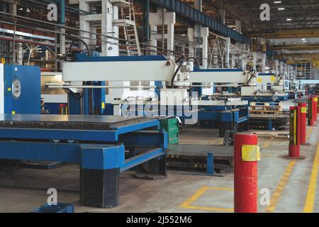Metalworking factory production line with machine tools. Workshop interior. Stock Photo