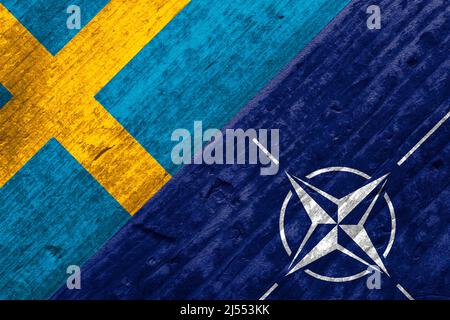KYIV, UKRAINE - April 20, 2022. Flags of Sweden and NATO. Stock Photo