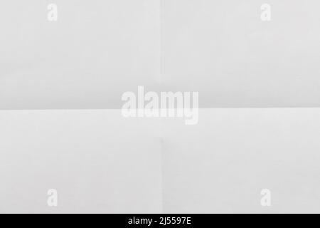 Texture of folded white paper as background, top view Stock Photo