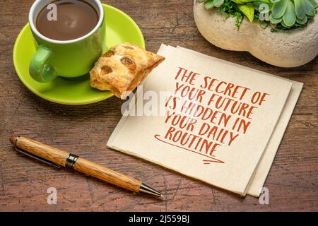 the secret of your future is hidden in your daily routine - inspirational handwriting on a napkin with a cup of coffee, lifestyle and personal develop Stock Photo