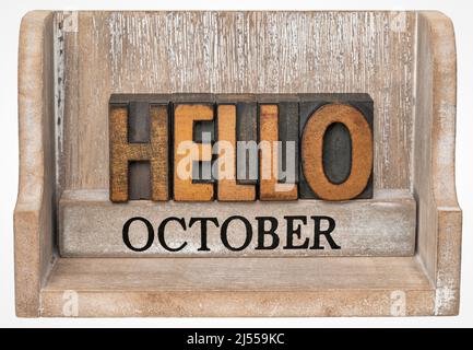 Hello October in vintage letterpress wood type inside grunge wooden box, calendar concept Stock Photo