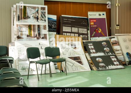 Piles of architectural blueprints, plans and paper projects used by students for their Master's degree exam in a university room in Sofia, Bulgaria Stock Photo