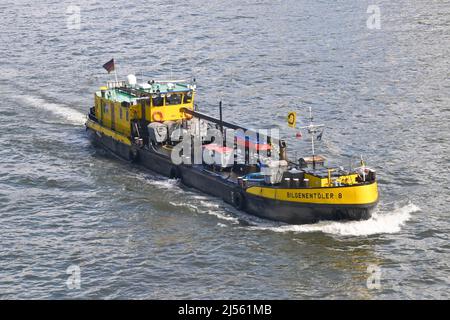 Koblenz, Germany – April 2022: Aerial view of an industrial barge sailing on the Rhine River Stock Photo