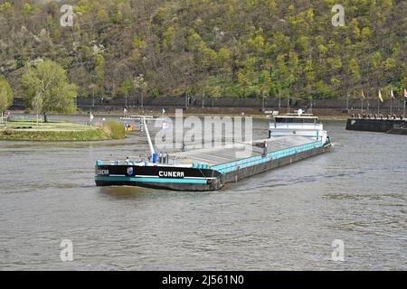 Koblenz, Germany – April 2022: Industrial barge on the Moselle River after leaving the Rhine River. Stock Photo