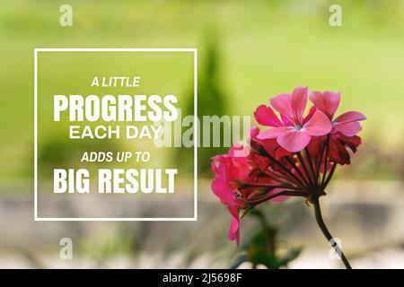 Geranium Flower Against Fresh Nature Background. Inspirational Quote. A Little Progress Each Day Adds Up To Big Result. Stock Photo