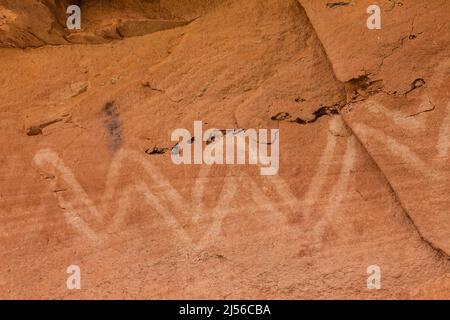 A pictograph rock art panel depicting a geometric design in Montezuma Canyon in Utah.  This Ancestral Puebloan Native American rock art is about 1000 Stock Photo