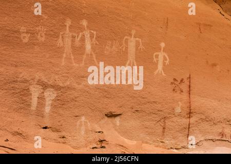 A pictograph rock art panel depicting anthropomorphic figures in Montezuma Canyon in Utah.  This Ancestral Puebloan Native American rock art is about Stock Photo