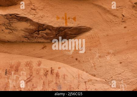 A pictograph rock art panel depicting anthropomorphic figures, handprints & animals in Montezuma Canyon in Utah.  This Ancestral Puebloan Native Ameri Stock Photo