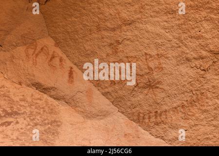 A pictograph rock art panel depicting images of Kokopelli, the flute player, in Montezuma Canyon in southeastern Utah.  This Ancestral Puebloan Native Stock Photo