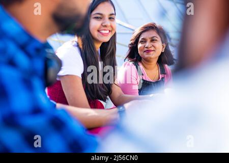 infian best friends spending time together outdoors in spring park Stock Photo