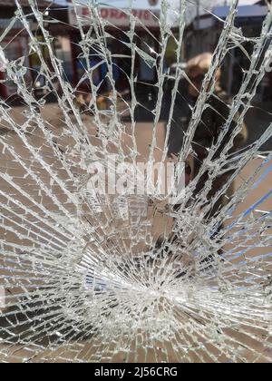 Bucharest, Romania - April 14, 2022: A broken tempered glass of a window. Stock Photo