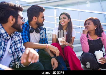 infian best friends spending time together outdoors in spring park Stock Photo