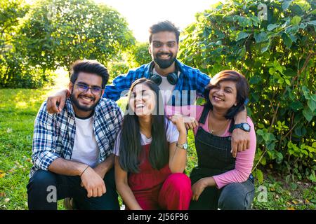 infian best friends spending time together outdoors in spring park Stock Photo