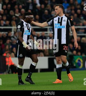 NEWCASTLE UPON TYNE, UK. APR 20TH. Newcastle United's Allan Saint-Maximin is comforted by Newcastle United's Chris Wood during the Premier League match between Newcastle United and Crystal Palace at St. James's Park, Newcastle on Wednesday 20th April 2022. (Credit: Michael Driver | MI News) Credit: MI News & Sport /Alamy Live News Stock Photo