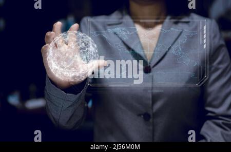business woman holding hand around word graphic, world wild connection business concept, This element finnish by NASA Stock Photo