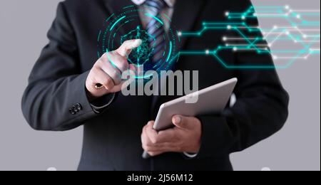 Business man touching info graphic lock, futuristic technology  interface concept Stock Photo