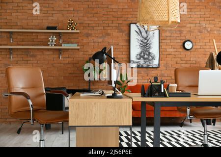 Workplaces with modern computers in stylish office Stock Photo