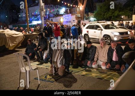 Israel. 04th Mar, 2022. After a joint Ramadan Iftar feast of Sheikh Jarrah residents and Israeli peace activists, clashes had occured with orthodox right wing crowd which barbecued next to the Salem family house which faces soon deportation. Following the events the Israeli police forced the neighberhood residents to get into their houses. One Palestinian youth was arrested on her house doorway. Jerusalem, Israel. Apr 20th 2022. (Photo by Matan Golan/Sipa USA) Credit: Sipa USA/Alamy Live News Stock Photo