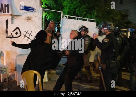 Israel. 04th Mar, 2022. After a joint Ramadan Iftar feast of Sheikh Jarrah residents and Israeli peace activists, clashes had occured with orthodox right wing crowd which barbecued next to the Salem family house which faces soon deportation. Following the events the Israeli police forced the neighberhood residents to get into their houses. One Palestinian youth was arrested on her house doorway. Jerusalem, Israel. Apr 20th 2022. (Photo by Matan Golan/Sipa USA) Credit: Sipa USA/Alamy Live News Stock Photo