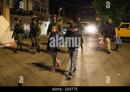 Israel. 04th Mar, 2022. After a joint Ramadan Iftar feast of Sheikh Jarrah residents and Israeli peace activists, clashes had occured with orthodox right wing crowd which barbecued next to the Salem family house which faces soon deportation. Following the events the Israeli police forced the neighberhood residents to get into their houses. One Palestinian youth was arrested on her house doorway. Jerusalem, Israel. Apr 20th 2022. (Photo by Matan Golan/Sipa USA) Credit: Sipa USA/Alamy Live News Stock Photo