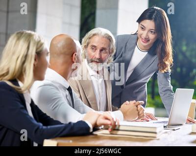 multiethnic group of corporate business people meeting in office Stock Photo