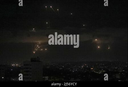 Streaks of light are seen as Israel's Iron Dome anti-missile system intercepts rockets launched from the Gaza Strip towards Israel, as seen from Gaza City. Witnesses and security sources said, hours after militants in the Palestinian enclave fired a rocket into Israel. The strikes, the second in 48 hours after a previous rocket strike, were concentrated on the centre of the blockaded coastal territory, they said. (Photo by Ahmed Zakot / SOPA Images/Sipa USA)