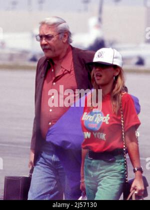 Jerry Buss and Jeanie Buss seen arriving at LAX Airport April 1992 Credit: Ralph Dominguez/MediaPunch Stock Photo