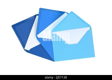 Envelopes of blue hues with blank white card isolated on white background, viewed from above. Top view Stock Photo