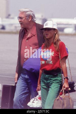 Jerry Buss and Jeanie Buss seen arriving at LAX Airport April 1992 Credit: Ralph Dominguez/MediaPunch Stock Photo