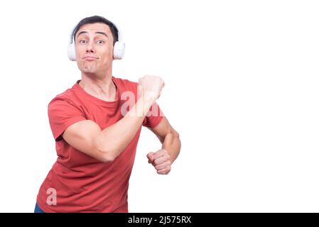 Delightful guy in headphones dancing in studio Stock Photo