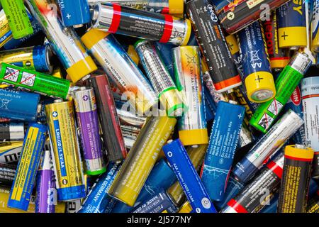Close Up of many different old batteries Stock Photo