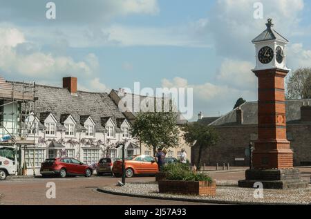 Twyn Square, Usk, Monmouthshire with a view of a row of old cottages, and the clock tower. Stock Photo