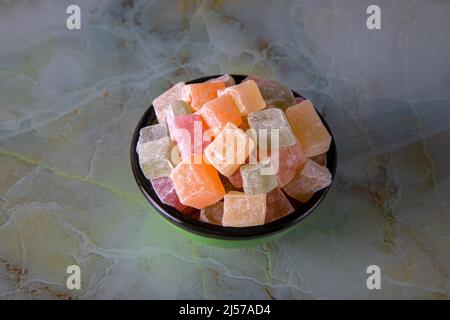 Traditional Turkish delight in a bowl on marble background Stock Photo