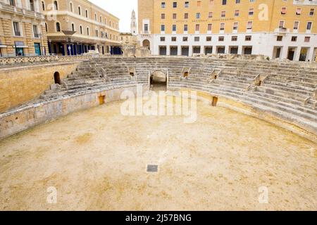 Augustan Roman theater of Lecce is located in the Sant'Oronzo Square (piazza) of the old town. Apulia, Italy. Stock Photo