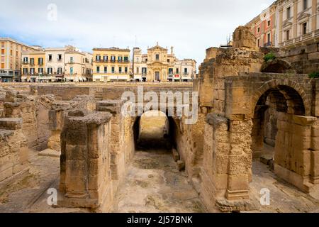 Augustan Roman theater of Lecce is located in the Sant'Oronzo Square (piazza) of the old town. Apulia, Italy. Stock Photo