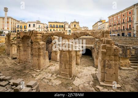 Augustan Roman theater of Lecce is located in the Sant'Oronzo Square (piazza) of the old town. Apulia, Italy. Stock Photo