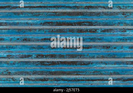 Distressed grunge textured rustic old wavy industrial metal sheet Stock Photo