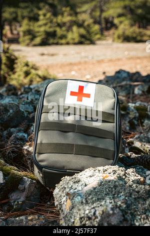 red first aid kit sign