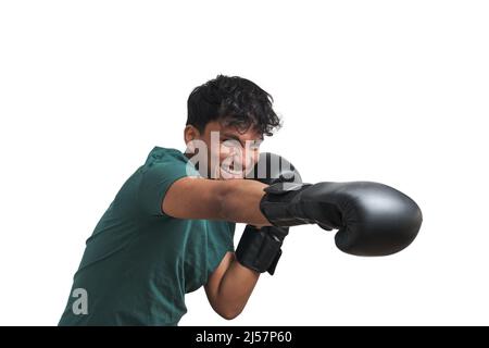 Young peruvian boxer throwing a right straight isolated. Stock Photo