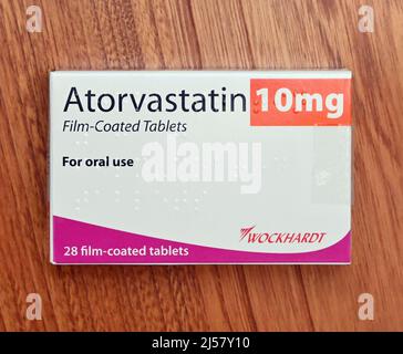 Photograph of Pack of Atorvastatin 10mg Film-Coated Tablets. For oral use. 28 film-coated tablets. Wockhardt Stock Photo