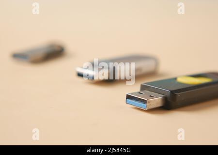 USB flash drive on blue background close up  Stock Photo