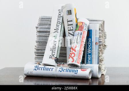 Stack of various daily newspapers Stock Photo