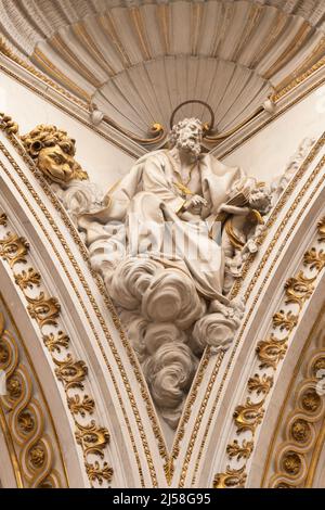 VALENCIA, SPAIN - FEBRUARY 14, 2022: The statue of St. Mark the Evangelist fom the cupola of the Cathedral by Josep Pujol from 18. cent. Stock Photo