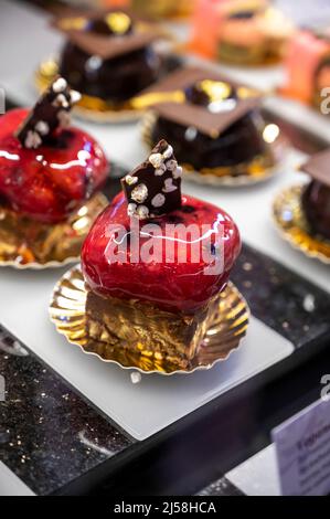 Austrian desserts, different types of chocolate and fruit cakes on display in cafe in Vienna. Stock Photo