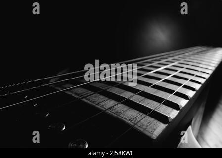 Classical fretboard six-string electric guitar. Stock Photo