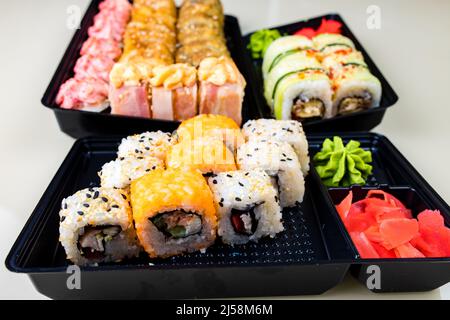 popular asian rolls lunch order to home online Stock Photo