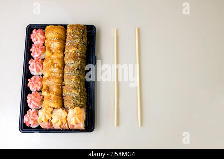 popular asian rolls lunch order to home online Stock Photo