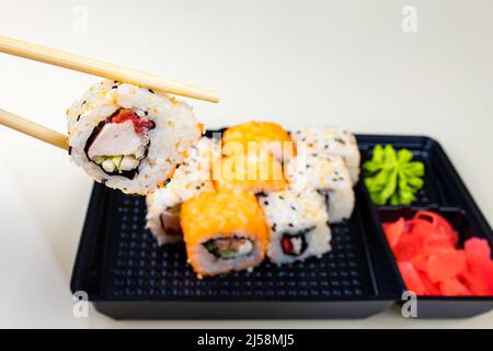 popular asian rolls lunch order to home online Stock Photo